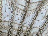 a close up of a curtain with a pattern on it