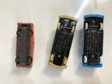 three different types of cell phones sitting on a table