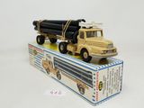 a toy truck that is sitting on top of a box