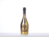 a close up of a bottle of champagne on a table