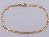 a yellow gold bracelet with a link and a clasp