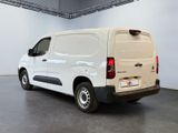 a white van that is parked in a garage