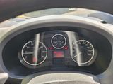 a close up of a car dashboard with a speedometer and gauges