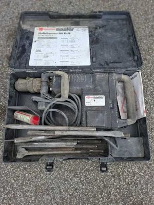 a tool kit in a case on the ground
