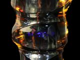 a close up of a glass of water on a table