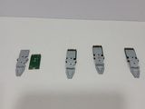 a close up of three different types of connectors on a white surface