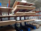 many shelves in the warehouse with boxes on them