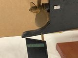 a small bird that is perched on the wing of a plane