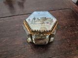 a glass box with a picture of a castle on it