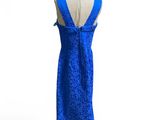 the back of a blue dress on a mannequin mannequin