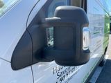 an image of a side view mirror of a van