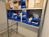 a room with a lot of boxes and boxes on the shelves