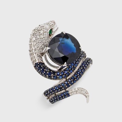 une photo d'une broche en forme de serpent, sertie de saphirs et de diamants