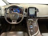 a picture of the interior of a car with a touch screen
