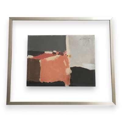 une peinture abstraite aux couleurs noir, orange et blanc, dans un cadre argenté