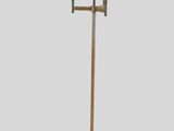 a close up of a lamp on a stand with a cord