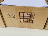 a cardboard box that has a lot of papers in it