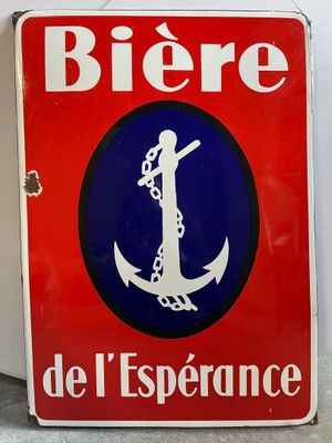 red and blue sign with a white anchor and chain on it