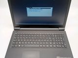 laptop computer with a keyboard and mouse sitting on a white surface