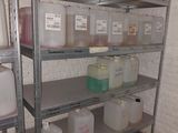 many containers and containers on the shelves in the room