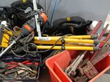 many different tools in a box on the table