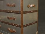 an image of a chest of drawers on a black background