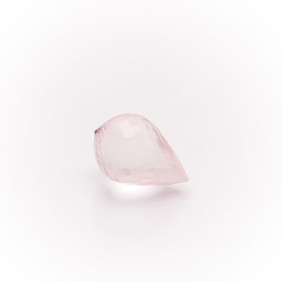 a pink quartz tear shaped stone on a white background