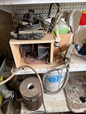 an image of a dirty kitchen with a lot of clutter