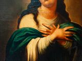 an oil painting of a woman with a green shaw around her neck