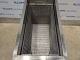 an image of a stainless steel sink with a drain