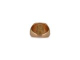 a close up of a gold ring on a white background