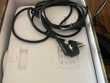a box that has a charger and a cord in it