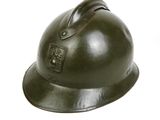 a helmet that is sitting on a white surface