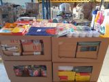 many boxes of supplies on a carton in a warehouse