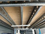 a picture of the inside of a truck with the door open