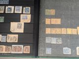 a book with stamps on the pages and a book with stamps on the pages