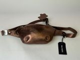 an image of a brown leather fanny bag with a tag on it