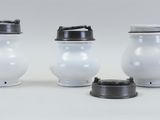three different types of water bottles on a white surface