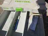 a person holding a box with a pen and a pen in it