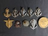 some of the medals are on a black surface