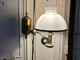 a lamp that is on top of a wooden table
