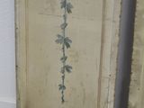 pair of antique painted wooden doors with flowers on them