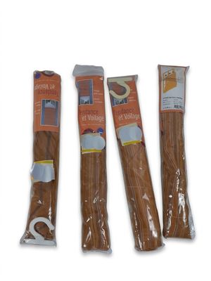 three bags of dog treats sitting next to each other on a white surface