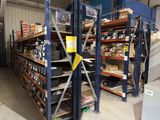 a large rack with many items on it in a warehouse