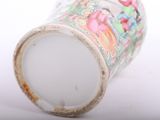 a close up of a vase on a white surface