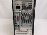 the computer is sitting on a white surface with a white background