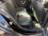 a car that has a seat in the back of it