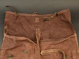 a brown bag that is sitting on a table
