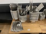 a table with a lot of silverware on it