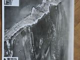 a black and white photo of a picture of a cliff